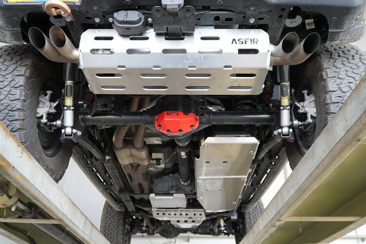 Full ASFIR skid plate kit installed under an off-road truck